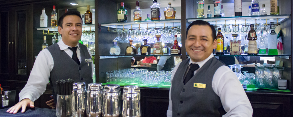 bar tenders at premier bar in royal solaris los cabos